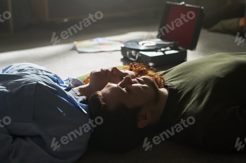 Preview: Couple Relaxing Together Listening to Vinyl Records