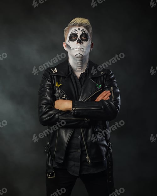 Preview: Man with catrin makeup wearing leather jacket. Studio portrait, Day of the dead.