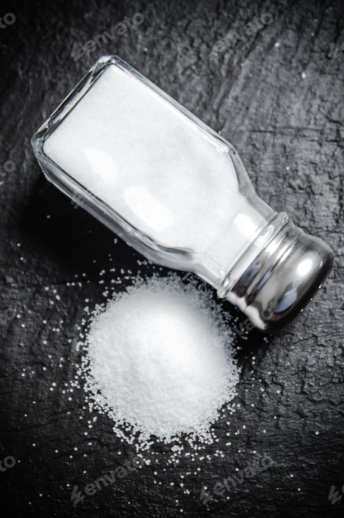 Preview: Salt background . On black table.