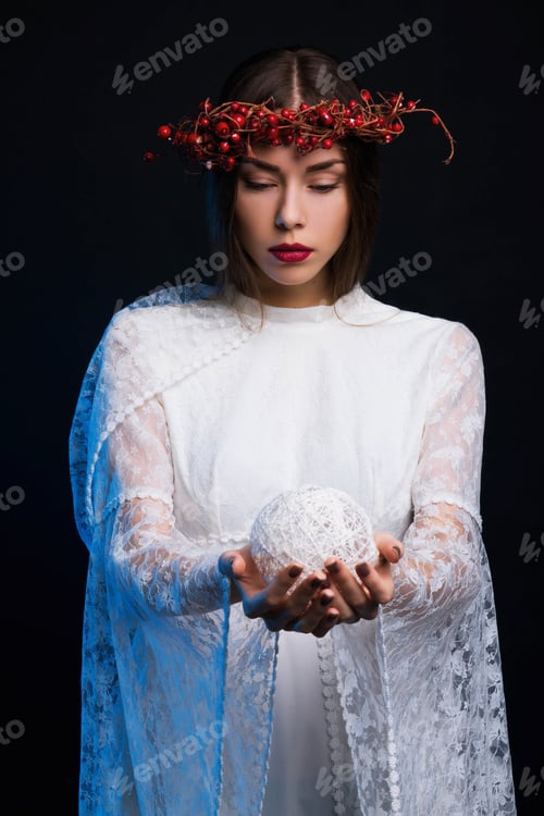 Preview: Girl With A Wreath On His Head On A Black Background