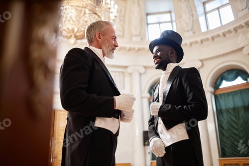 Preview: Two Gentlemen Wearing Tailcoats Talking