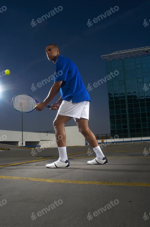 Preview: Tennis player on rooftop court
