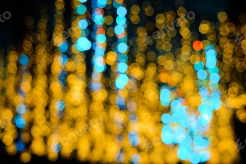 Preview: Christmas street garland in blur. Festive lights background. Soft focus