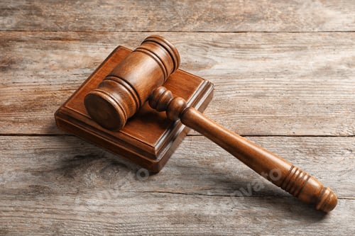 Preview: Judge's gavel on wooden background. Law concept