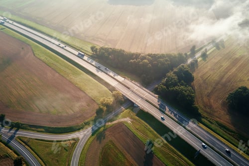 Preview: Car traffic on highway at summer day, aerial view