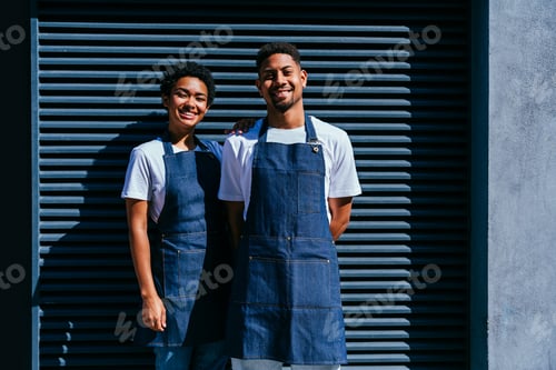 Preview: Barista and waiter working in a bar cafeteria shop