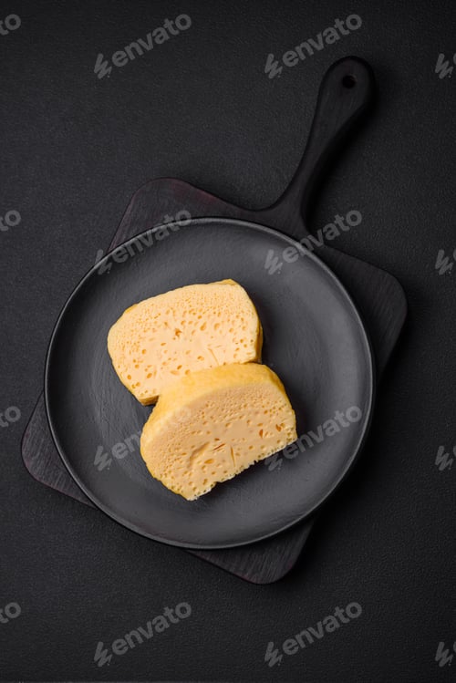 Preview: Delicious omelet with milk, spices and herbs cut into large pieces