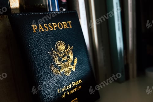 Preview: American passport leaning against the dark shelf of a forgotten bookstore.