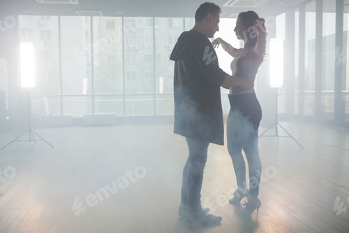 Preview: Beautiful girl doing lady styling in front of her partner.