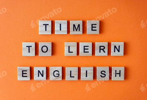 Preview: Word time to learn English. Motivation. The phrase is laid out in wooden letters top view