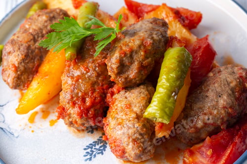 Preview: Turkish Food Kofte - Kofta with Tomato Sauce and Potatoes. (Turkish name; Izmir kofte)