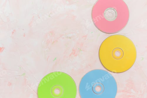 Preview: CD or DVD discs on pink background