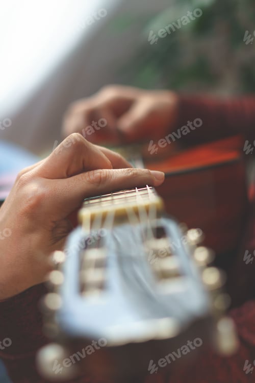 Preview: man's hands playing the Spanish guitar