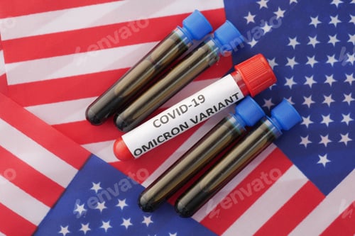 Preview: omicron variant corona virus blood test tube on USA flag