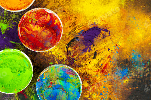 Preview: Indian Holi festival colours in small bowls on dark background