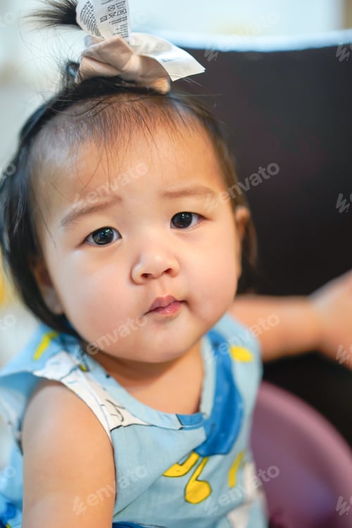 Preview: Close up face of little cute girl.