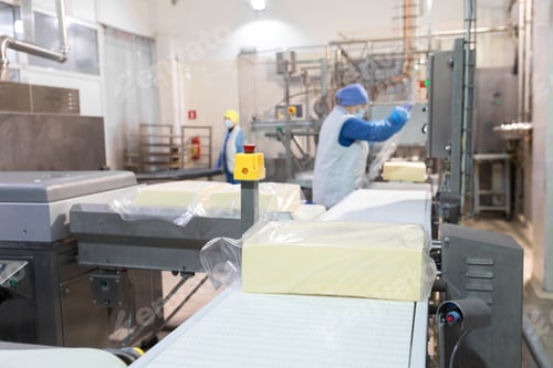 Preview: Worker packs butter at the dairy plant