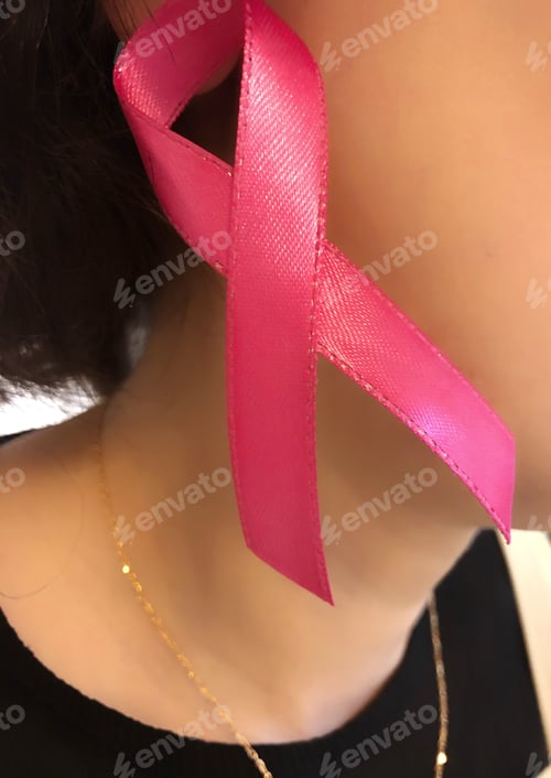 Preview: October is Breast Cancer Awareness Month
Woman wearing a fashionable pink ribbon earring