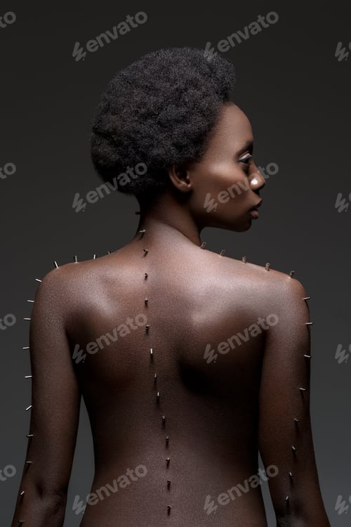 Preview: Beautiful black girl with metal pins