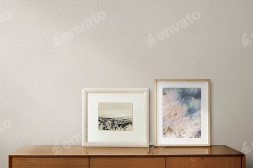 Preview: Picture frames on a wooden cabinet