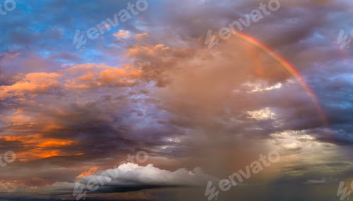 Preview: Beautiful sunset sky scenery. Bright colorful orange and yellow clouds on horizon