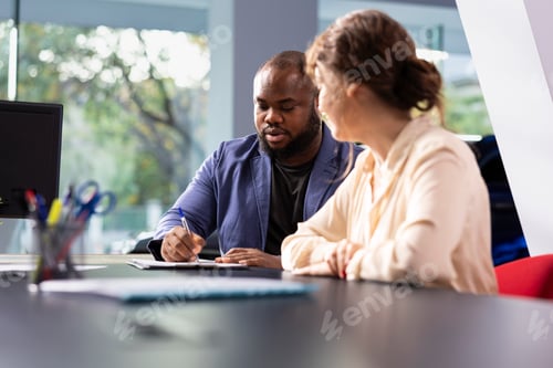 Preview: Customers completing forms after comparing car models and choosing automobile