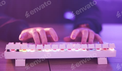 Preview: Gaming, keyboard and hands of a person typing for the internet, connection and communication. Cyber