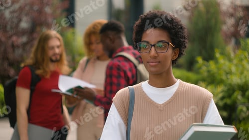 Preview: African American young student woman high school schoolgirl smiling toothy happy pupil girl outdoors