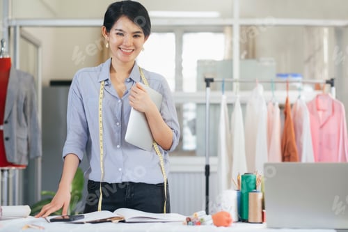 Preview: Portrait young woman tailor design owner shop