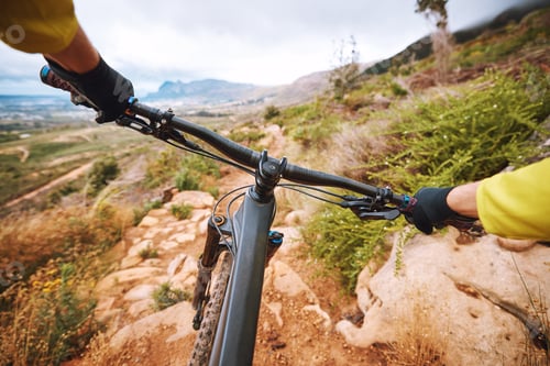 Preview: Pov, hands and cycling man in nature with mountain view for fitness, adventure and training morning
