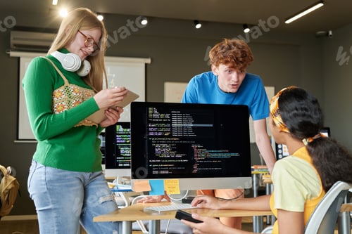 Preview: Students Working on Programming Code Together