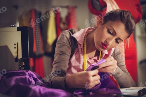Preview: Young Woman Tailor Sewing