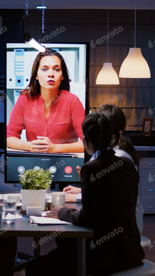 Preview: Workaholics multi-ethnic businesspeople discussing financial strategy during online videocall
