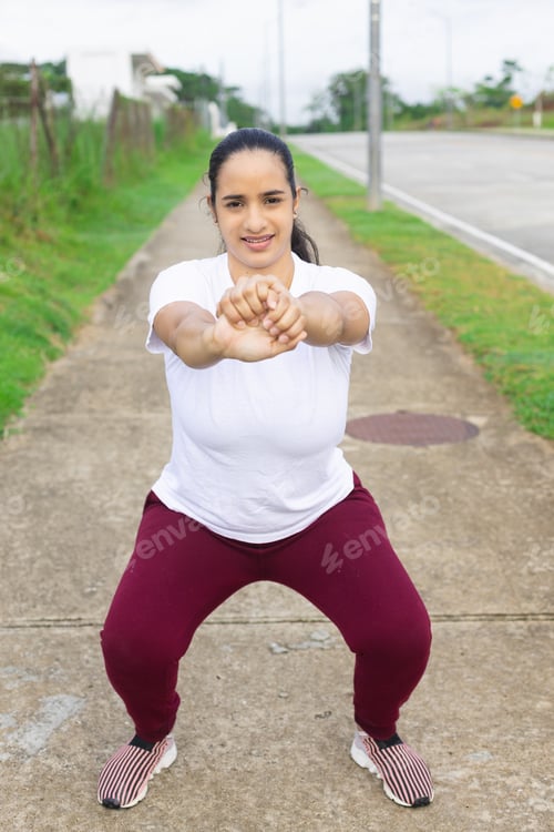 Preview: latin woman doing arms stretch