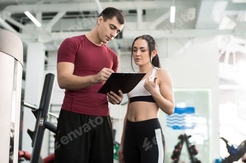 Preview: Woman Talking to Fitness Coach