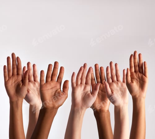 Preview: Cropped shot of a diverse group of people raising their hands