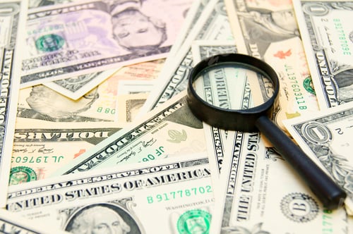 Preview: Money (dollars) and magnifier.