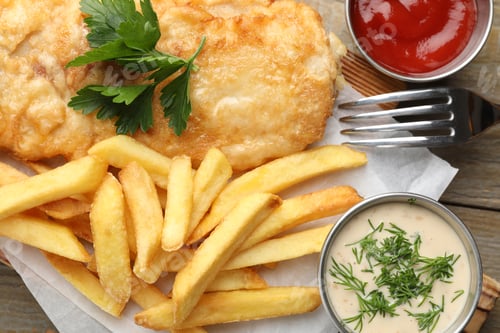 Preview: British Traditional Fish and chips served with sauces on wooden table, flat lay