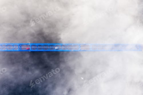 Preview: Top down view on a metal bridge over the river Lielupe wrapped in fog in the autumn morning