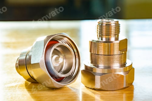 Preview: High frequency connectors component with a shiny copper nickel plating covering