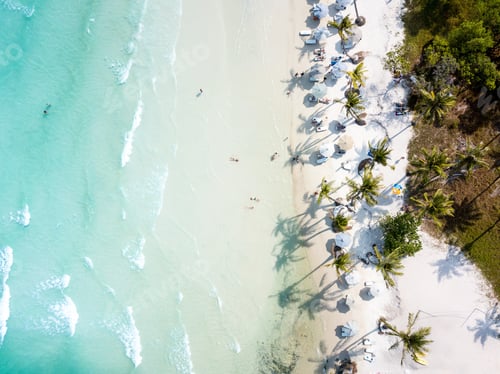 Preview: Aerial shot of a tropical paradise with white beaches.