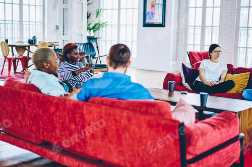 Preview: Good looking hipster guys in trendy clothes resting indoors
