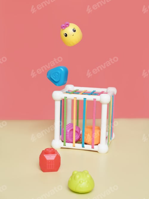 Preview: baby educational toy. a multi-colored cube. Development of fine motor skills