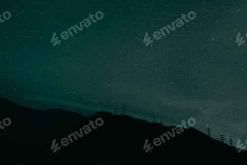 Preview: Stars Over Mountain at Night Under Dark Sky
