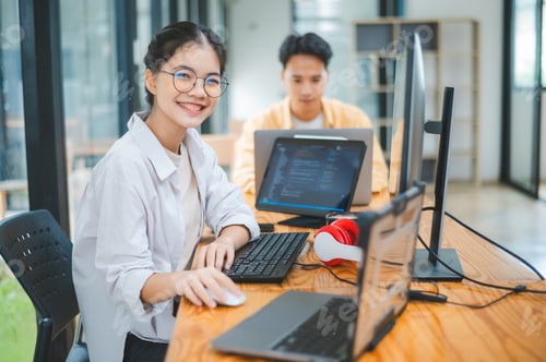 Preview: Female programmer working on coding, software development and web design.