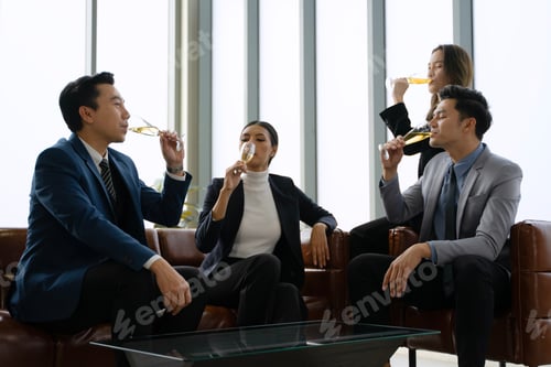 Preview: White collar workers are celebrating at office.