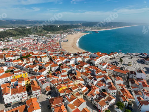 Preview: Praia da Nazare beach and rooftops aerial view