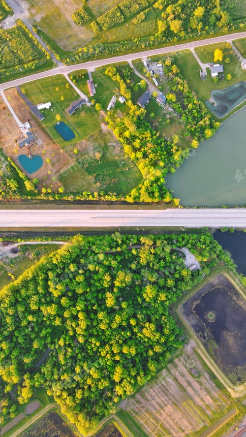 Preview: View of a road from the air with fields on a sunny day