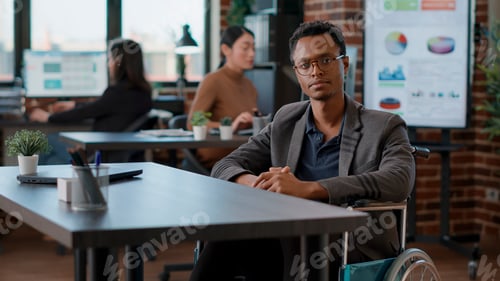 Preview: POV of businessman with disability attending videocall meeting