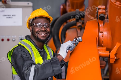 Preview: African American Black Engineer Professional Worker Working in Heavy Industry in Safety Uniform